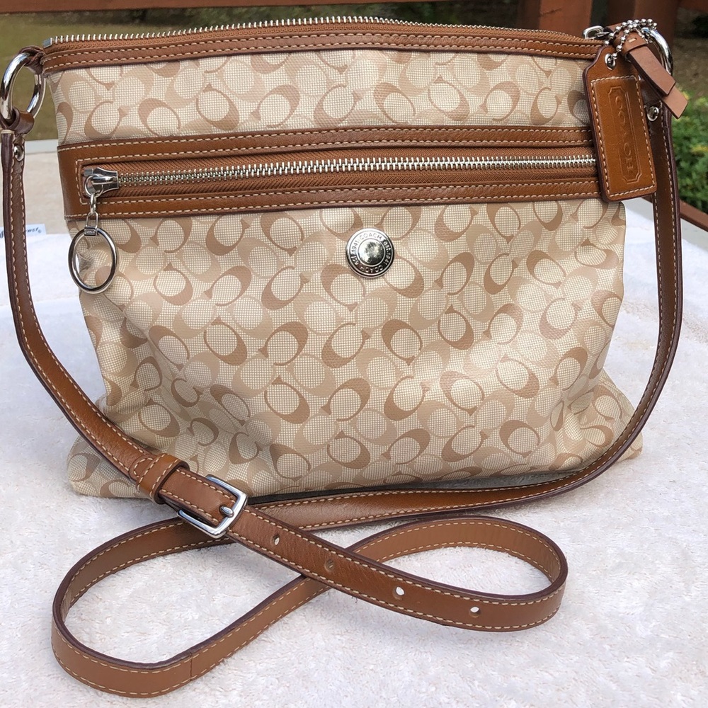 Coach Chelsea tan and brown crossbody bag.
